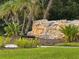 Terra Verde community entrance sign surrounded by lush landscaping at 4722 Flagler Beach Way, Kissimmee, FL 34746