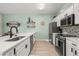 Well-designed kitchen features modern appliances, bright lighting, and ample counter space at 4722 Flagler Beach Way, Kissimmee, FL 34746