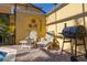 Poolside offers lounge chairs, a grill, and outdoor decor enhancing backyard enjoyment at 4722 Flagler Beach Way, Kissimmee, FL 34746