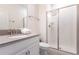 Clean bathroom featuring a glass-enclosed shower and modern fixtures at 4835 Memories Ln, Kissimmee, FL 34746