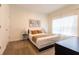 Comfortable bedroom featuring a cozy bed, soft lighting, and a spacious closet at 4835 Memories Ln, Kissimmee, FL 34746