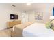 Cozy bedroom with neutral decor, a TV, and carpeted floors at 4835 Memories Ln, Kissimmee, FL 34746