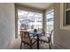Outdoor patio area with seating and views of the pool at 4835 Memories Ln, Kissimmee, FL 34746