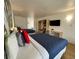 This bedroom features 2 beds, a TV, and a microwave for convenient living and relaxation at 5245 W Irlo Bronson Memorial Hwy # 210, Kissimmee, FL 34746