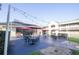 Outdoor patio featuring multiple tables and string lights above at 5245 W Irlo Bronson Memorial Hwy # 210, Kissimmee, FL 34746