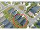 Aerial view of a suburban home with a well-maintained yard and surrounding neighborhood at 561 Vittorio Dr, Winter Haven, FL 33884