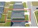 Aerial view of home showcasing the roof, yard, driveway, and proximity to neighboring houses at 561 Vittorio Dr, Winter Haven, FL 33884