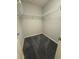 Empty closet with metal shelving and gray carpet at 561 Vittorio Dr, Winter Haven, FL 33884