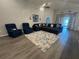 Bright living room features comfortable seating, an open floor plan, and plenty of natural light at 561 Vittorio Dr, Winter Haven, FL 33884
