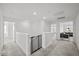 Upstairs hallway with carpet flooring and lots of natural light at 6019 Forest Perch Dr, St Cloud, FL 34771