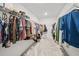 Large walk-in closet with ample storage and organizational features, offering plenty of room for clothing at 6019 Forest Perch Dr, St Cloud, FL 34771