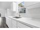 A kitchen featuring quartz countertops and stainless steel appliances at 650 Mesilla Dr, Kissimmee, FL 34758