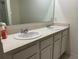 Bathroom featuring a double sink vanity with white cabinets at 6783 Grace Hammock Rd, Harmony, FL 34773