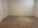 Bedroom featuring neutral carpeting and a window for natural light at 6783 Grace Hammock Rd, Harmony, FL 34773