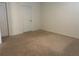 Bedroom featuring neutral carpeting and a window for natural light at 6783 Grace Hammock Rd, Harmony, FL 34773