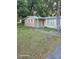 Cozy single-story home with mixed facade and mature trees in a quaint neighborhood at 7511 Us Highway 98 N, Lakeland, FL 33809