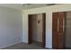 Bright bedroom featuring carpet flooring and closet with folding doors at 804 Wildwood Cir, Port Orange, FL 32127