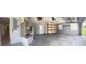 A look inside the home's spacious two-car garage with shelving and storage space at 804 Wildwood Cir, Port Orange, FL 32127