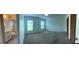 Primary bedroom featuring neutral paint, carpeting, ensuite bath with tiled shower, and walk in closet at 804 Wildwood Cir, Port Orange, FL 32127