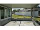 Enclosed patio with screen window, views of back yard and plenty of sunlight at 804 Wildwood Cir, Port Orange, FL 32127
