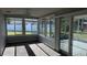 Sun room featuring ample natural light, carpeted flooring, and sliding glass doors at 804 Wildwood Cir, Port Orange, FL 32127
