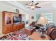 Bright living room with decorative ceiling and large windows at 819 San Raphael St, Kissimmee, FL 34759