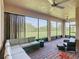 Covered patio with brick flooring, comfortable seating and a scenic view of the backyard at 819 San Raphael St, Kissimmee, FL 34759