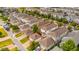 Aerial view of a neighborhood with homes, garages, and landscaping at 11843 Fiction Ave, Orlando, FL 32832