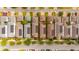 Aerial view of neighborhood with solar panels, showcasing the property's location and community at 11843 Fiction Ave, Orlando, FL 32832