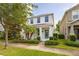 Charming two-story home with a well-manicured lawn and a welcoming front porch at 11843 Fiction Ave, Orlando, FL 32832