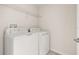 Laundry room area with washer and dryer at 11843 Fiction Ave, Orlando, FL 32832