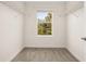 Walk-in closet with a window and wire shelving at 11843 Fiction Ave, Orlando, FL 32832