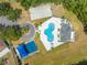 Aerial view of community amenities including a pool, playground, and basketball court at 1338 Lake Biscayne Way, Orlando, FL 32824