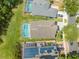 Aerial view of house with private backyard pool in a beautiful, sunny residential neighborhood at 1338 Lake Biscayne Way, Orlando, FL 32824