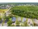 Aerial view of multiple homes with solar panels in a well-maintained suburban neighborhood at 1338 Lake Biscayne Way, Orlando, FL 32824