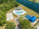 An aerial view of community amenities, including a pool, playground and basketball court at 1338 Lake Biscayne Way, Orlando, FL 32824