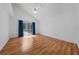 Cozy bedroom with hardwood floors, vaulted ceilings, and natural lighting at 1338 Lake Biscayne Way, Orlando, FL 32824