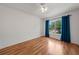 Bedroom featuring hardwood floors, natural light from the window and ceiling fan at 1338 Lake Biscayne Way, Orlando, FL 32824