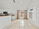 Bright kitchen with granite counters, white cabinets, and stainless appliances at 1338 Lake Biscayne Way, Orlando, FL 32824