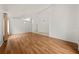 Bright, open living space showcasing wood floors and high ceilings at 1338 Lake Biscayne Way, Orlando, FL 32824