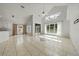 Open floor plan with tile flooring, high ceilings, and natural light at 1338 Lake Biscayne Way, Orlando, FL 32824