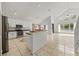 Open floor plan with granite counters, vaulted ceilings, and lots of light at 1338 Lake Biscayne Way, Orlando, FL 32824
