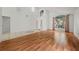 Spacious living room boasts wood floors and neutral wall colors at 1338 Lake Biscayne Way, Orlando, FL 32824