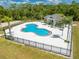 Aerial view of a beautiful community pool and recreation area, perfect for Gathering fun and relaxation at 1338 Lake Biscayne Way, Orlando, FL 32824