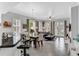 Open-concept floor plan connects the kitchen, dining, and living areas, perfect for entertaining at 1501 Northern Harrier Way # 101, Kissimmee, FL 34747