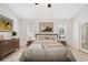 Cozy bedroom featuring neutral colors, art decor and slider to patio at 154 Academy Oaks Pl, Altamonte Springs, FL 32714