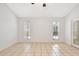 Living room boasting tile flooring, neutral paint and lots of natural light at 154 Academy Oaks Pl, Altamonte Springs, FL 32714