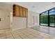 Bright sun room features tile flooring and views of the backyard pool area at 154 Academy Oaks Pl, Altamonte Springs, FL 32714