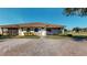 Charming single story villa with brick paved driveway and well-maintained landscaping at 1558 Cumin Dr, Poinciana, FL 34759