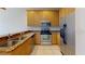 Kitchen with granite effect countertops, and stainless steel appliances at 1558 Cumin Dr, Poinciana, FL 34759